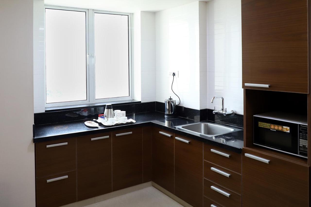 Quality Inn Patria Suites, Rajkot Bagian luar foto